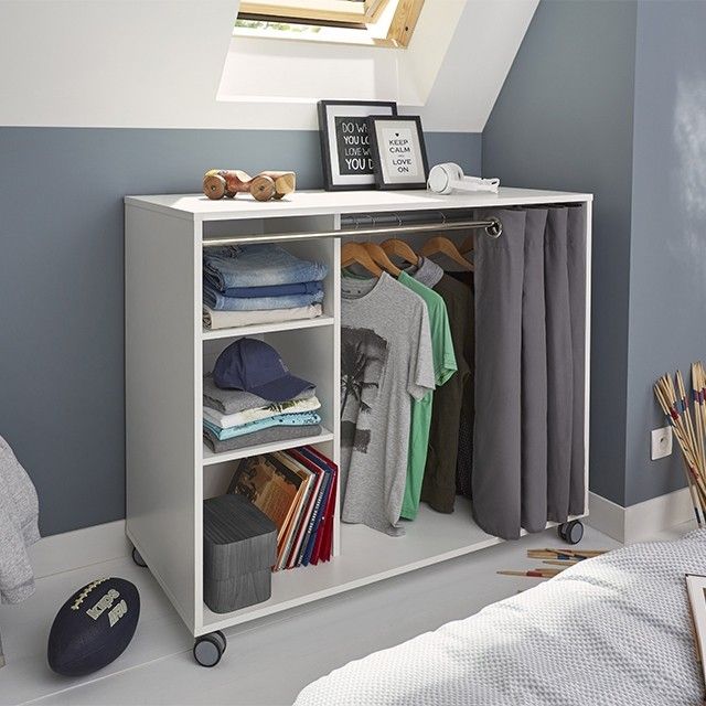 White rolling baby wardrobe with hanging rail, shelves and curtain