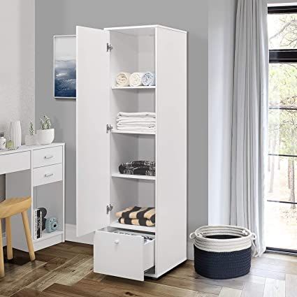 Tall white baby wardrobe with single door, shelves and bottom drawer