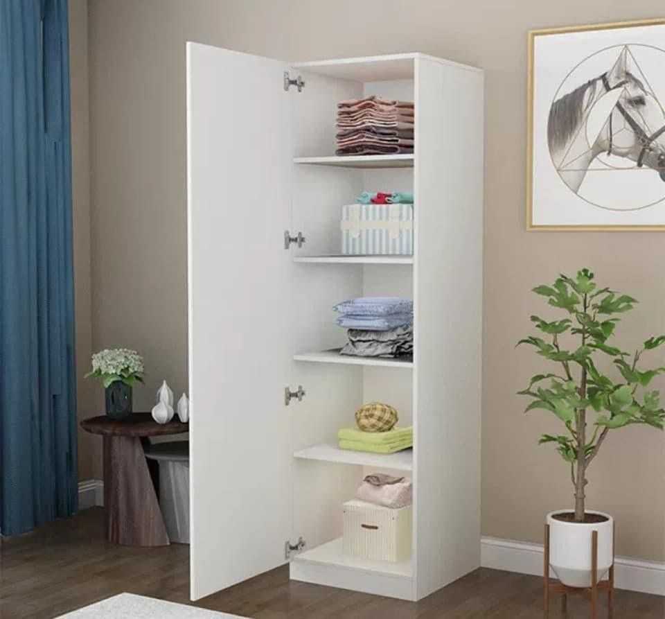 Tall slim white baby wardrobe with single door and five shelves